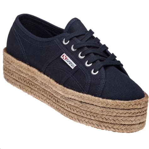 navy blue platform trainers.